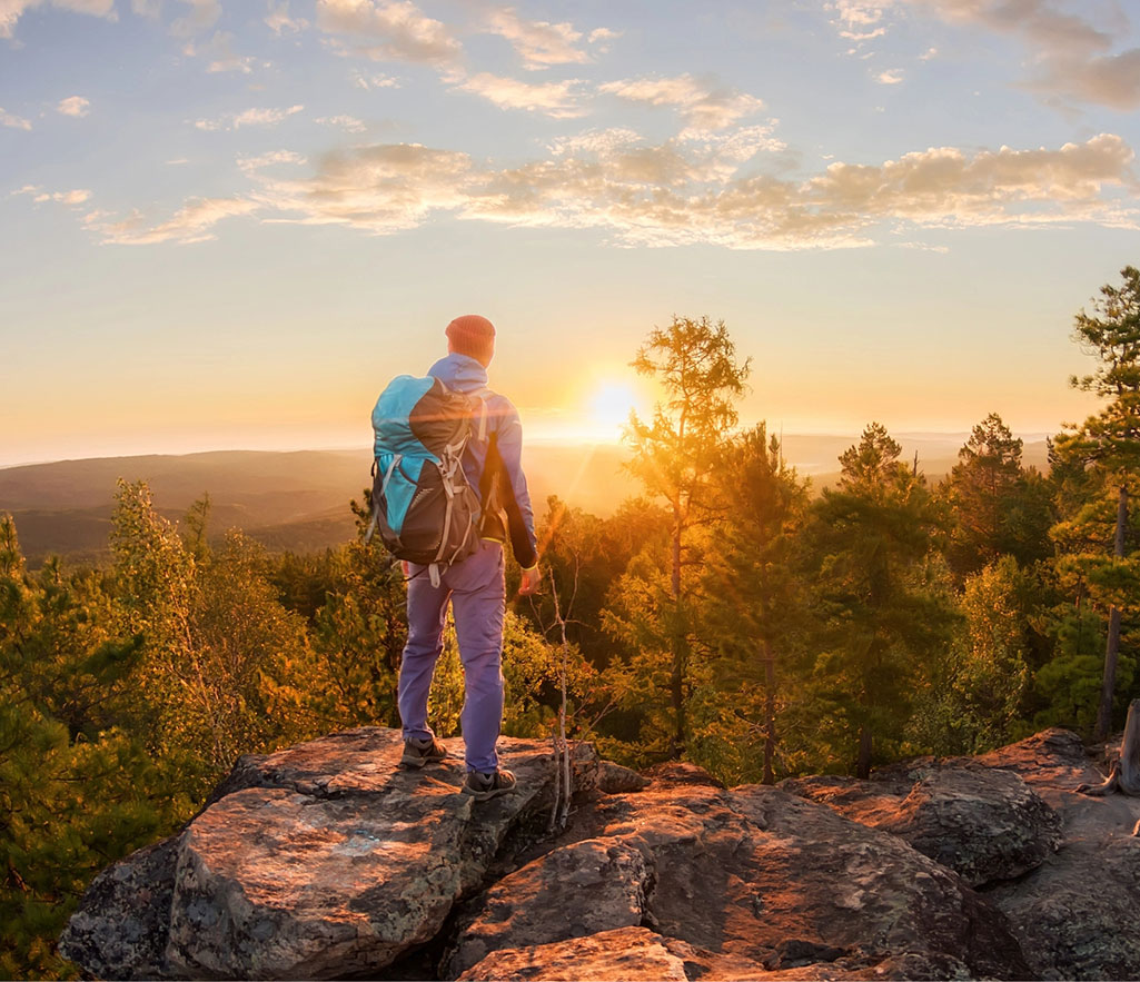 Enjoing sunset from a peak